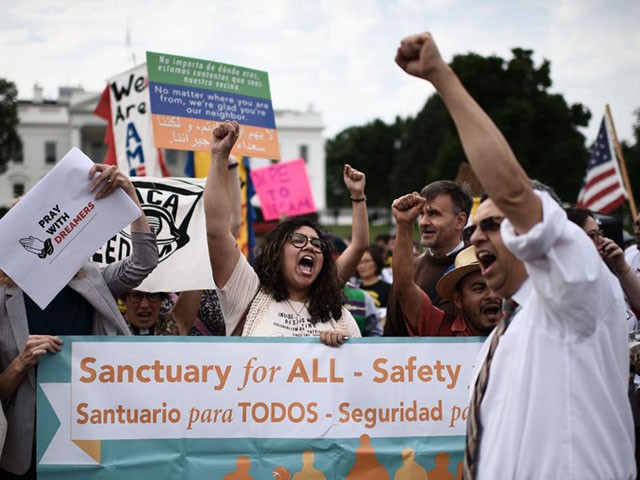 Immigrants and supporters demonstrate during a rally in support of the Deferred Action for Childhood Arrivals (DACA) in front of the White House on September 5, 2017 in Washington DC.