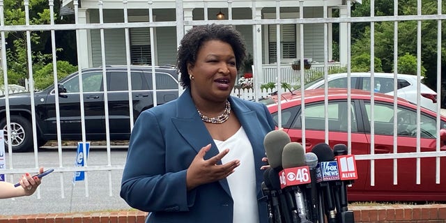 Democratic gubernatorial candidate Stacey Abrams speaks to reporters on primary day in Georgia, on May 24, 2022 in Atlanta, Georgia